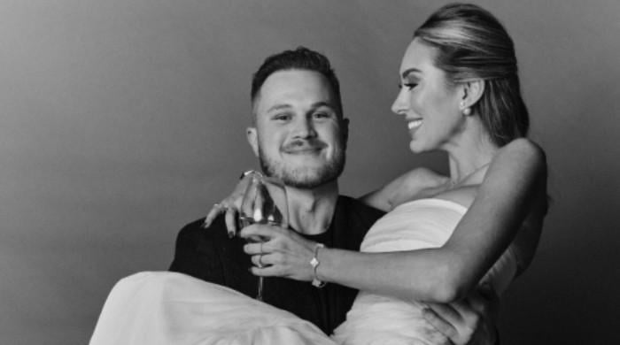 Zach Bryan shares first wedding photos with wife Samantha Leonard