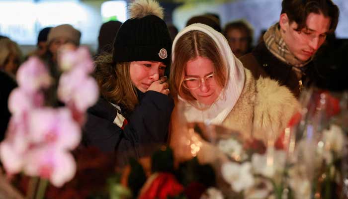 People react outside the Le Constellation bar, after a fire and explosion during a New Year’s Eve party in the upscale ski resort of Crans-Montana in southwestern Switzerland on January 1, 2026. — Reuters