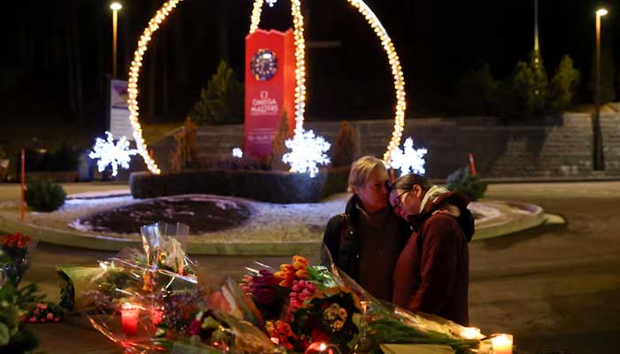People embrace near the Le Constellation bar, after a fire and explosion during a New Year’s Eve party where several people died in the upscale ski resort of Crans-Montana in southwestern Switzerland on January 1, 2026. — Reuters