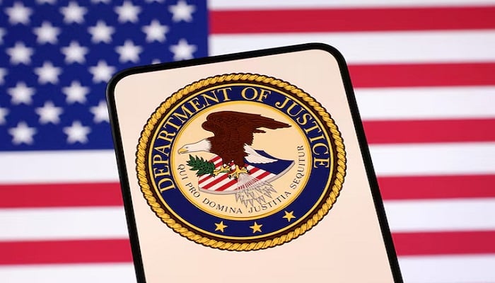 United States Department of Justice logo and U.S. flag are seen in this illustration taken April 23, 2025.— Reuters