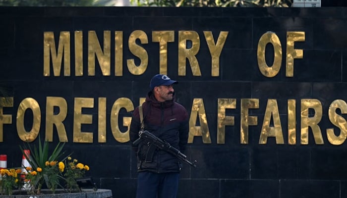 A security personnel stands guard outside the office of the Ministry of Foreign Affairs in Islamabad. — AFP/File