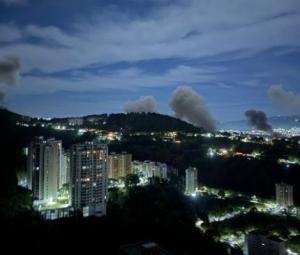 Column of smoke seen, loud noises heard in Venezuelan capital