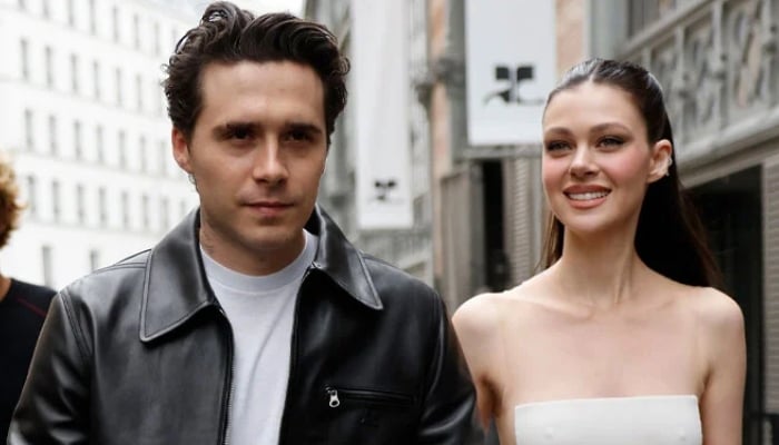 Nicola shared a loved-up photo of herself and her husband, believed to have been taken in Florida