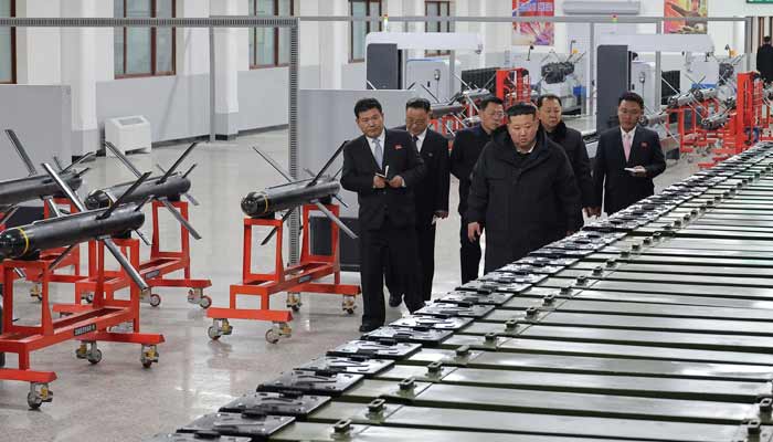 North Korean leader Kim Jong Un visiting a factory involved in making tactical guided weapons, at an undisclosed place in North Korea.— AFP