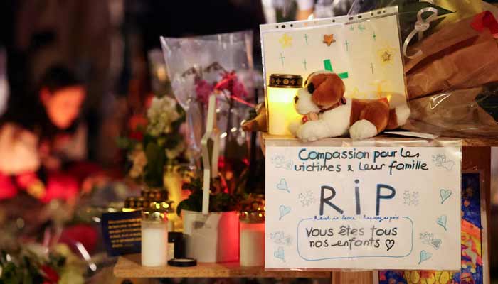 A sign reading Compassion for the victims and their families, Rest in Peace, you are all our children is placed at a makeshift memorial outside the Le Constellation bar, after a deadly fire and explosion during a New Years Eve party in the upscale ski resort of Crans-Montana in southwestern Switzerland, January 3, 2026. — Reuters