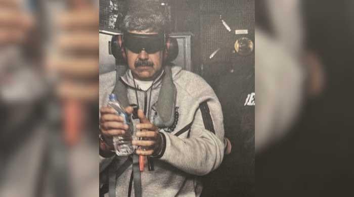 Decoding Venezuela President Nicolas Maduro's post-arrest, blindfolded image shared by Trump