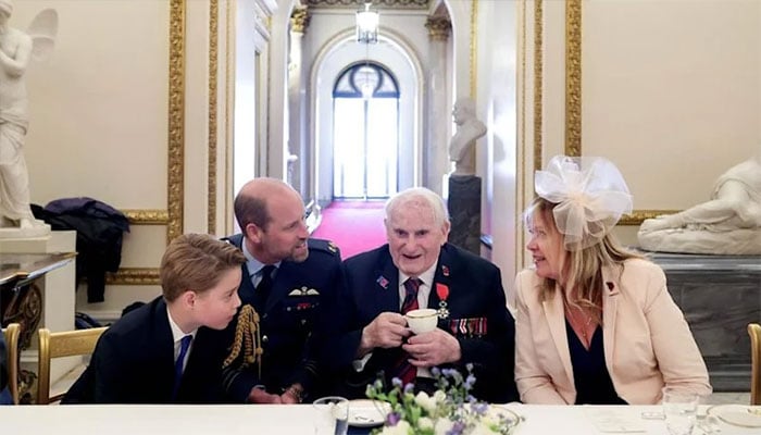 Prince George at tea party.