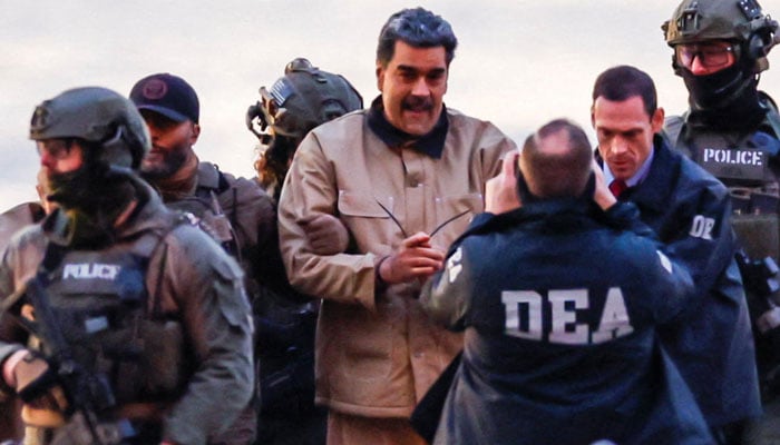 Captured Venezuelan President Nicolas Maduro arrives at the Downtown Manhattan Heliport, as he heads towards the Daniel Patrick Manhattan United States Courthouse for an initial appearance on January 5, 2026. — Reuters