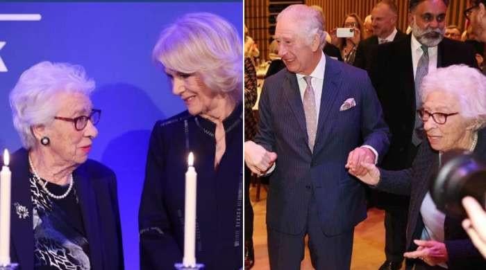 Palace shares throwback pics of King and Queen with late Holocaust survivor 