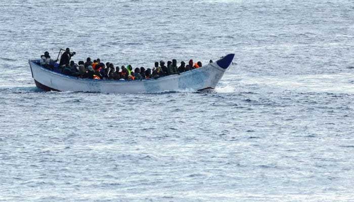This undated photo shows an overcrowded boat transporting people across the sea. — Reuters/File