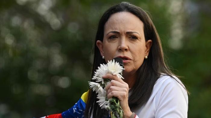Venezuelan opposition leader Machado vows to return home 'as soon as possible' 