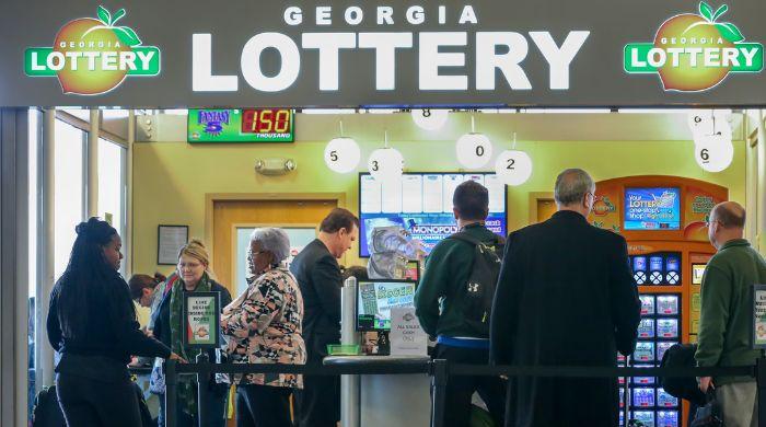 Who is Georgia resident who won $983M Mega Millions jackpot, largest ever in state history?