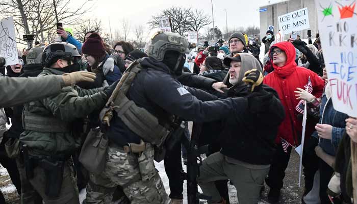 Protestors clash with federal agents outside the Bishop Henry Whipple Federal Building in Saint Paul, Minnesota, on January 8, 2026.— AFP