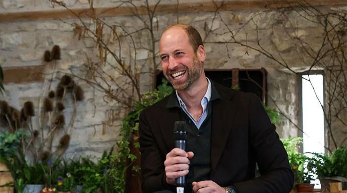 Prince William gets his boots muddy after praising NHS heroes