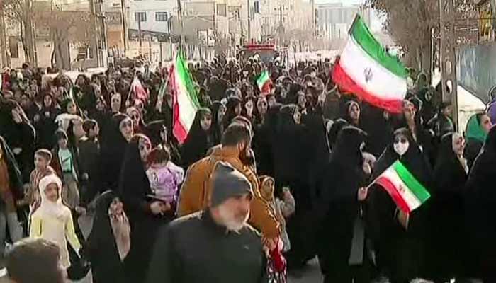 Picture shows pro-government demonstrators chanting slogans in Ardabil, northwest Iran. — AFP