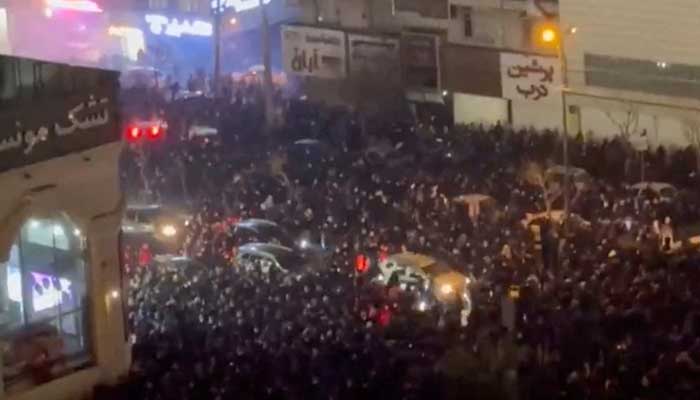 People gather on the streets amid anti-government unrest in Tehran, Iran, in this still image obtained from social media video released on January 8, 2026. — Reuters