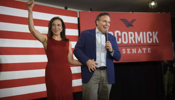 Dina Powell McCormick is pictured alongside her husband Dave McCormick, who is Republican senator from Pennsylvania. — AFP/File
