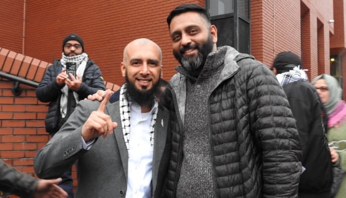 Majid Freeman outside the court with his Hindu witness Ajay Nagla. — ‘Devon Winters’