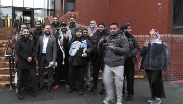 Majid Freeman outside the court with his supporters and his Hindu witness Ajay Nagla. — ‘Devon Winters’