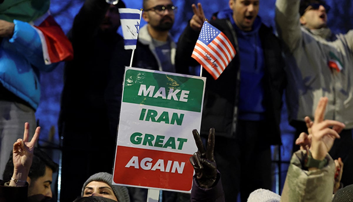 Demonstrators gesture outside the Iranian embassy during a rally in support of nationwide protests in Iran, in London, Britain, January 12, 2026. — Reuters