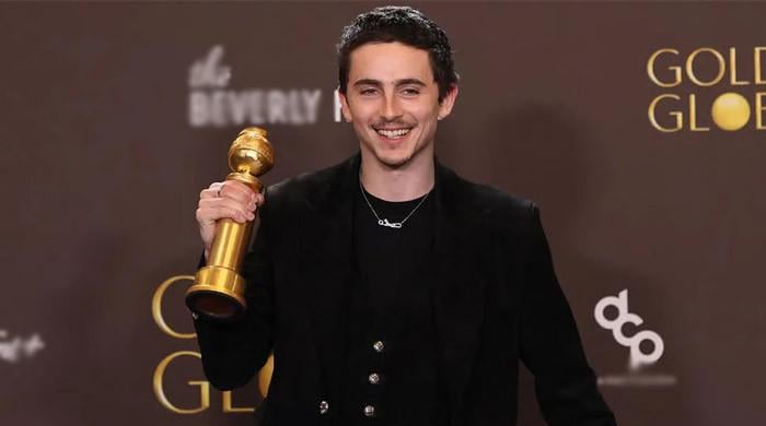 Timothée Chalamet can't get enough of first Golden Globe trophy