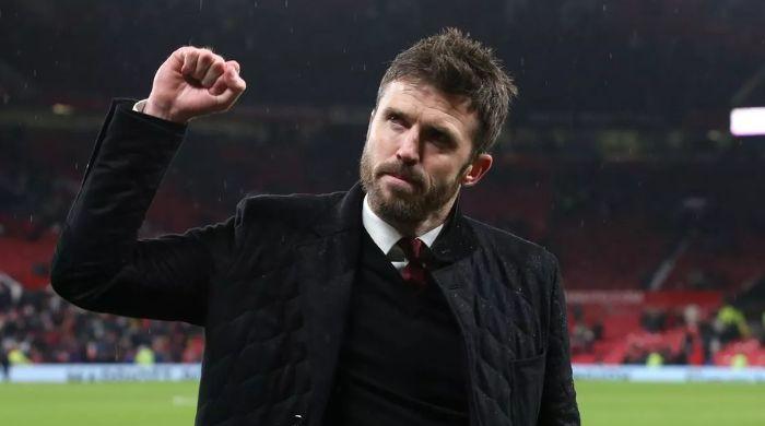Why did Manchester United choose Michael Carrick as interim head coach?