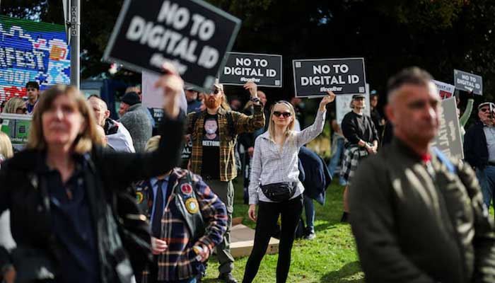Protesters take part in a No to Digital ID demonstration against the planned introduction of a government-issued digital ID for all British adults, near to the Labour Party Conference in Liverpool, Britain, September 28, 2025. — Reuters