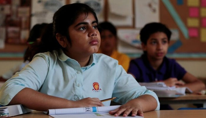 Students attend class at a private school in Islamabad. — Reuters/File