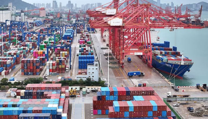 hows a cargo ship and shipping containers at the port of Lianyungang in Jiangsu, China. — Reuters/File