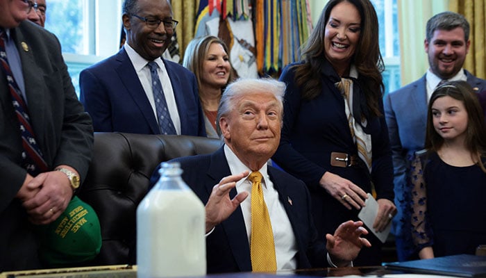 US President Donald Trump reacts, on the day of a signing ceremony for the Whole Milk for Healthy Kids Act, in the Oval Office at the White House in Washington, D.C., US, January 14, 2026. — Reuters