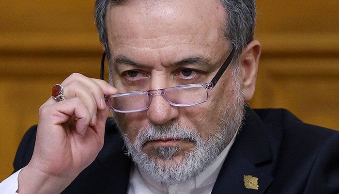 Iranian Foreign Minister Abbas Araqchi adjusts glasses during a press conference following talks with Russian Foreign Minister Sergei Lavrov in Moscow, Russia, December 17, 2025. — Reuters