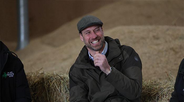 Prince William goes farming to handle 'external pressure' in hunting cap