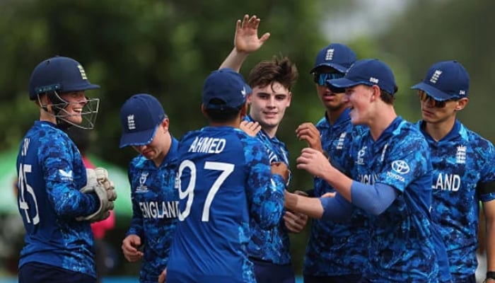 England players celebrate a wicket during their ICC U19 Mens Cricket World Cup 2026 match against Pakistan at Takashinga Sports Club on January 16, 2026 in Harare, Zimbabwe. — ICC
