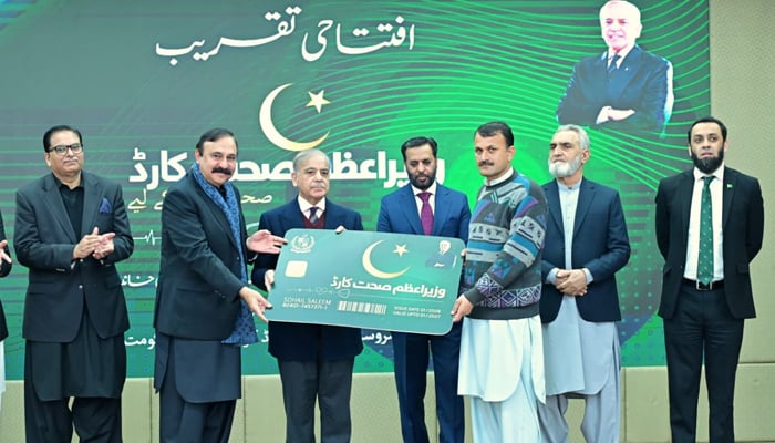 Prime Minister Shehbaz Sharif presents symbolic health card to resident of Azad Jammu and Kashmir to mark launch of PMs Health Card scheme, Islamabad, January 16, 2026. — X/@PTVNewsOfficial