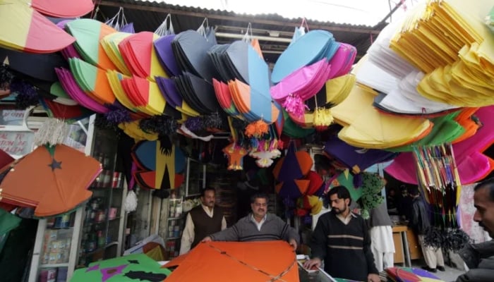 Kites are displayed at a local market in Rawalpindi. — Reuters/File