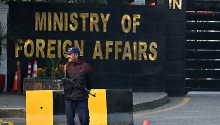 A Pakistani police officer stands guard outside the Ministry of Foreign Affairs in Islamabad on January 18, 2024. — AFP