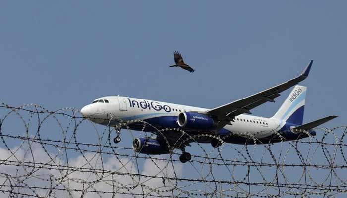 An IndiGo Airlines aircraft flies low as it prepares to land in Mumbai, India, October 22, 2025.— Reuters