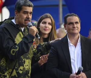 Venezuela interim leader sacks industry minister allied with ousted president Maduro