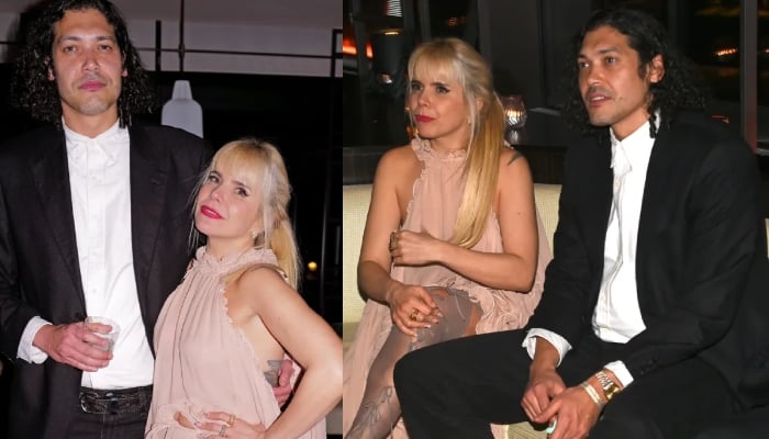 Paloma Faith leaned on her partners support in a black and white snap