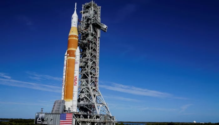 Nasas next-generation moon rocket, the Space Launch System (SLS) rocket with the Orion crew capsule, rolls to the launch pad at the Kennedy Space Centre in Cape Canaveral, Florida, US, January 17, 2026. —Reuters