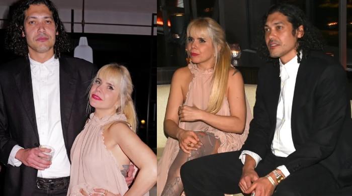 Paloma Faith shows off baby bump with boyfriend by her side