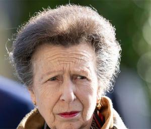 Princess Anne gives romantic flowers to girl on trip