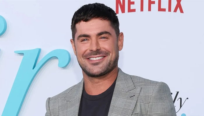 Zac Efron makes rare public appearance at Patriots-Texans game