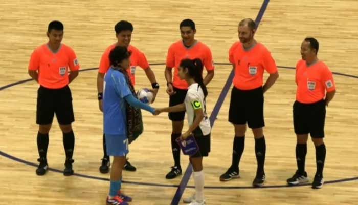 Pakistan and Indian players shake hands after the toss during the SAFF Championship 2026. — Reporter