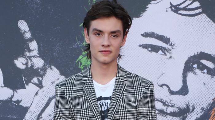 Louis Partridge shaves his head despite family's pleas: 'Post-breakup hair'