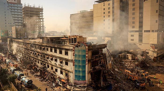 Gul Plaza fire: Rescuers try to access upper floors as missing number jumps to 81