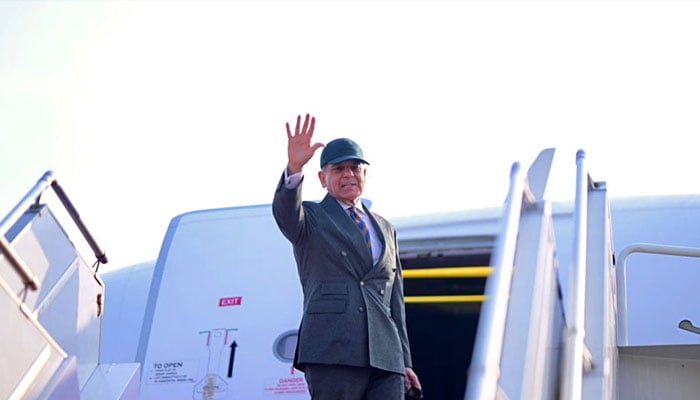 PM Shehbaz waves hand before departing for Switzerland to attend Annual Meeting of the World Economic Forum (WEF) at an airbase in Rawalpindi on January 20, 2026. — X@PTVNewsOfficial