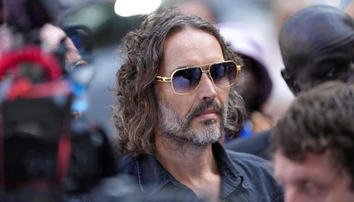 Russell Brand awaits court hearing in pending legal charges