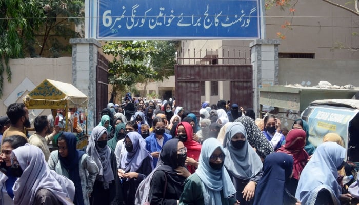 Students coming out of Women Girls College Korangi after appearing in their Intermediate examinations in Karachi, May 7, 2025. — APP