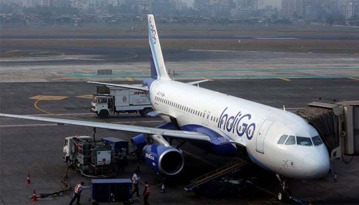 An IndiGo Airlines Airbus A320 aircraft is pictured parked at a gate at Mumbai airport in this undated image. — Reuters